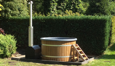 Luxury hottub met externe houtkachel